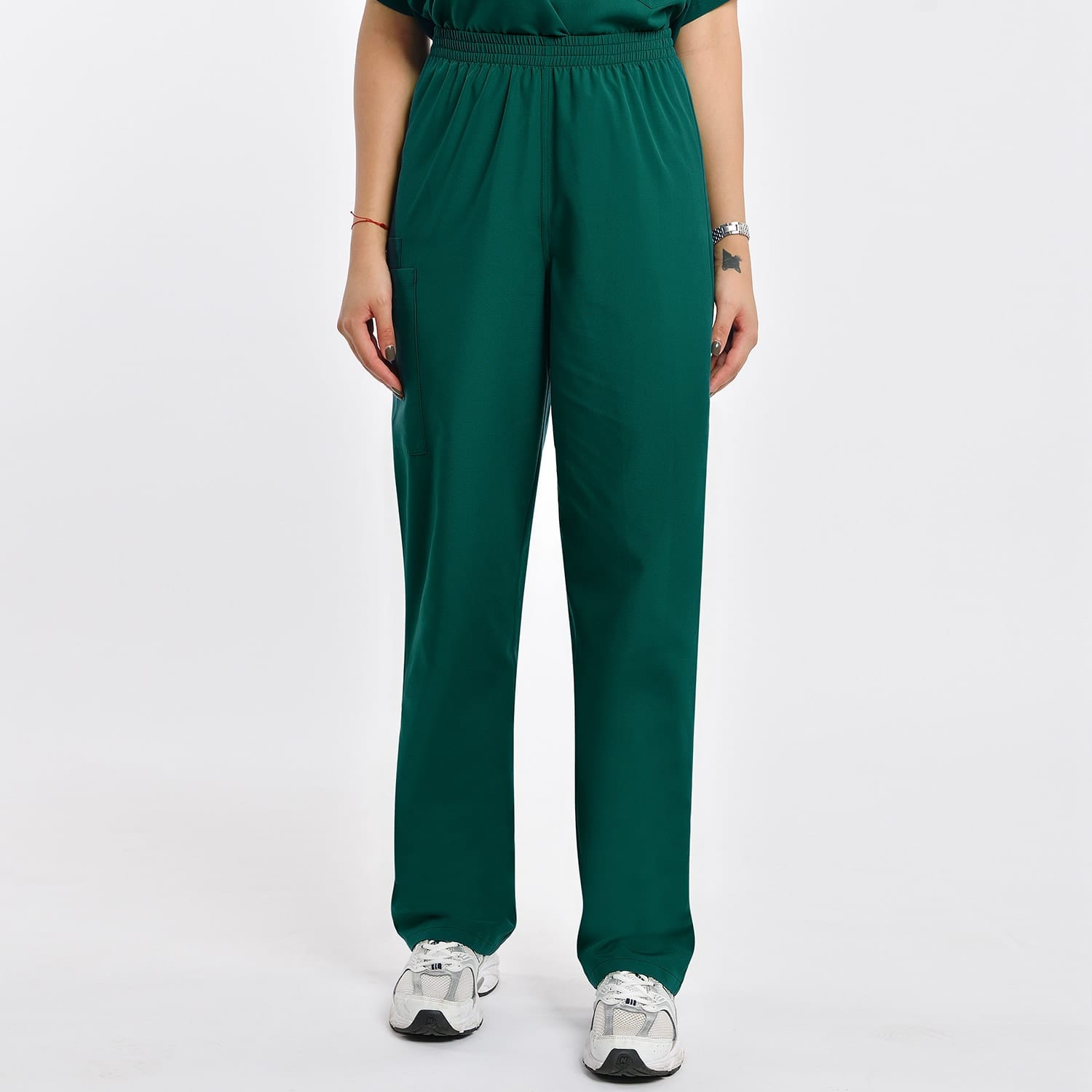 Green women's scrub pants with two pockets, providing comfort, durability, and a professional look for healthcare workers.
