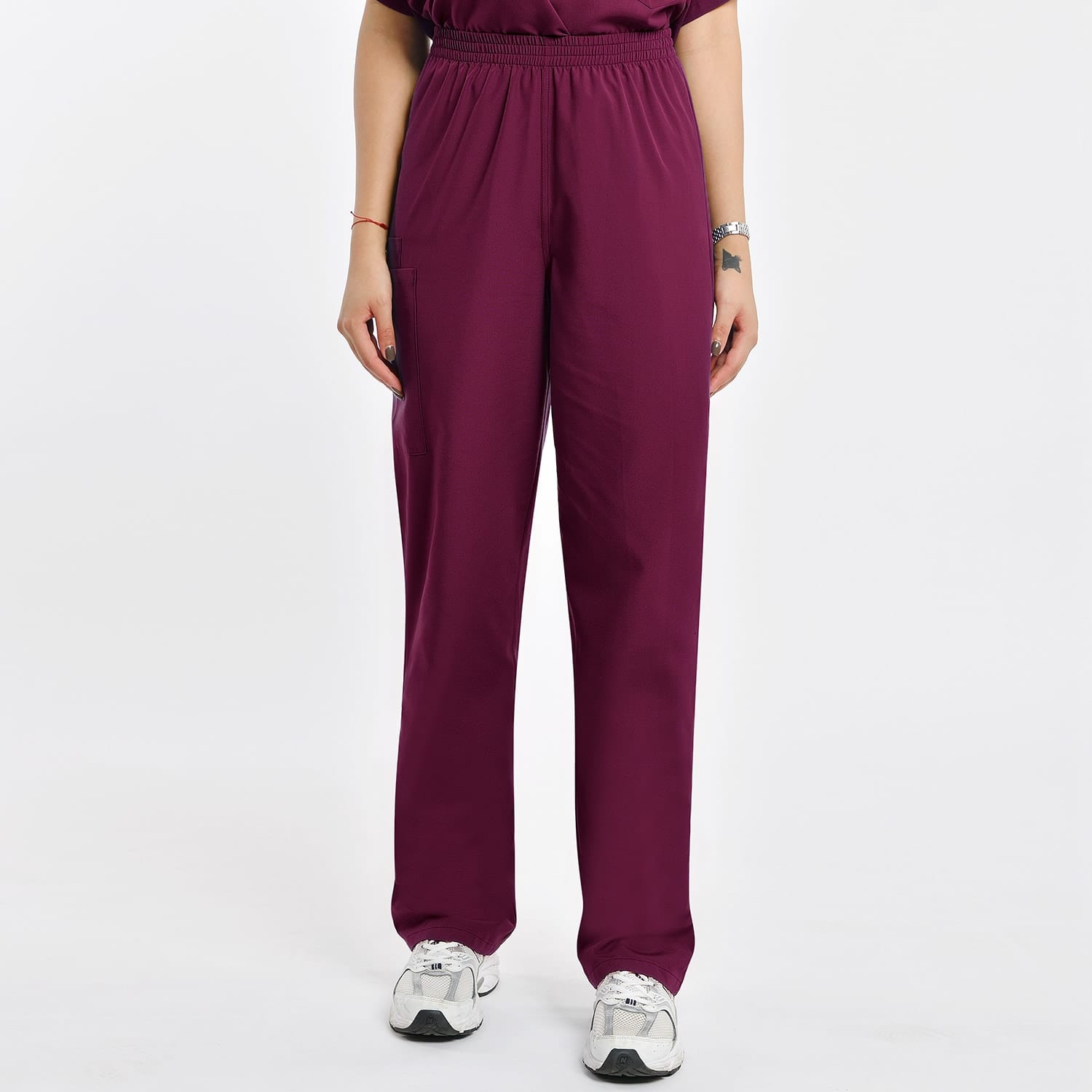 Women's 2 pocket scrub pants in purple, perfect for healthcare professionals, offering comfort, style, and durability.