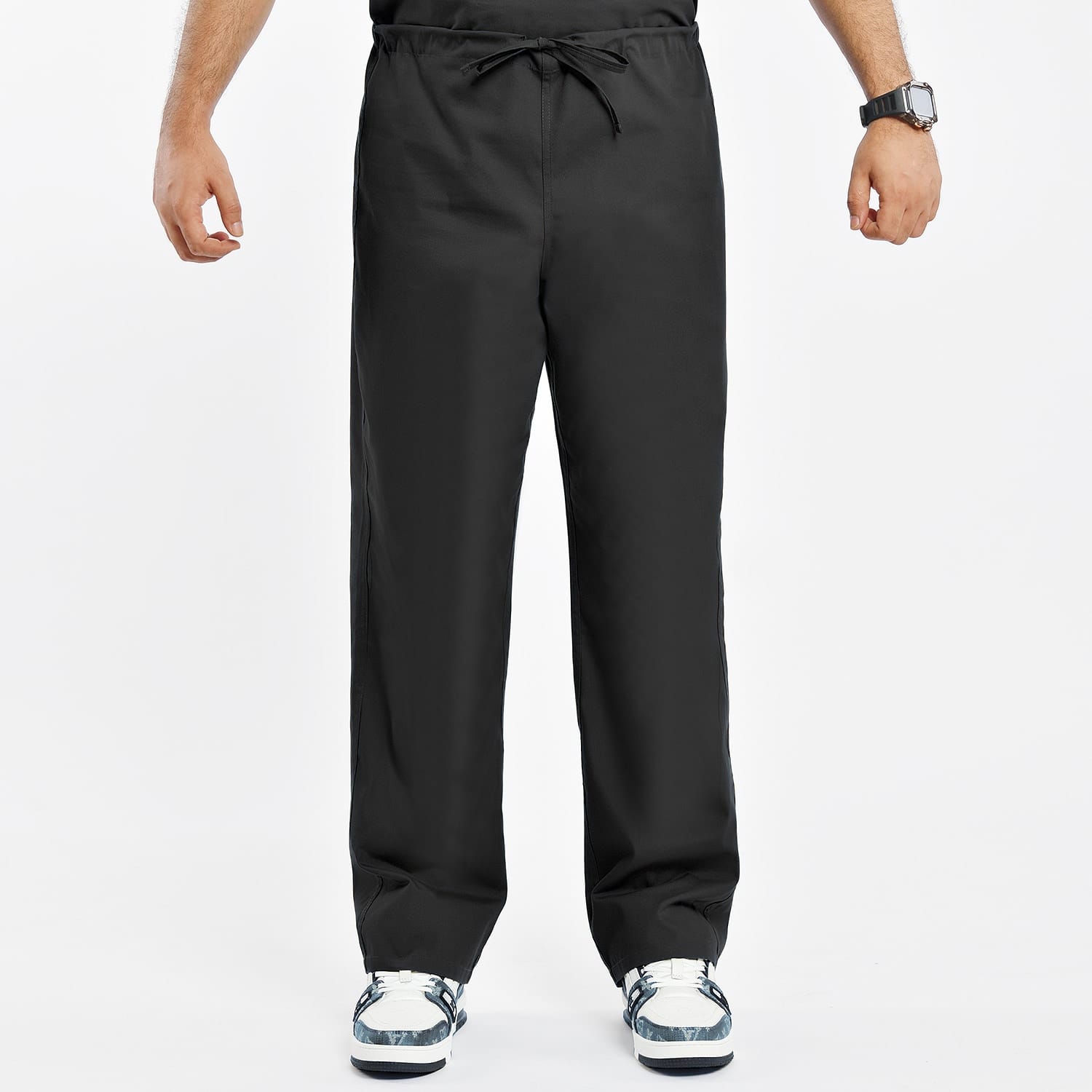 Black unisex scrub pants with drawstring, ideal for men and women in healthcare, offering a comfortable fit with functional pockets.