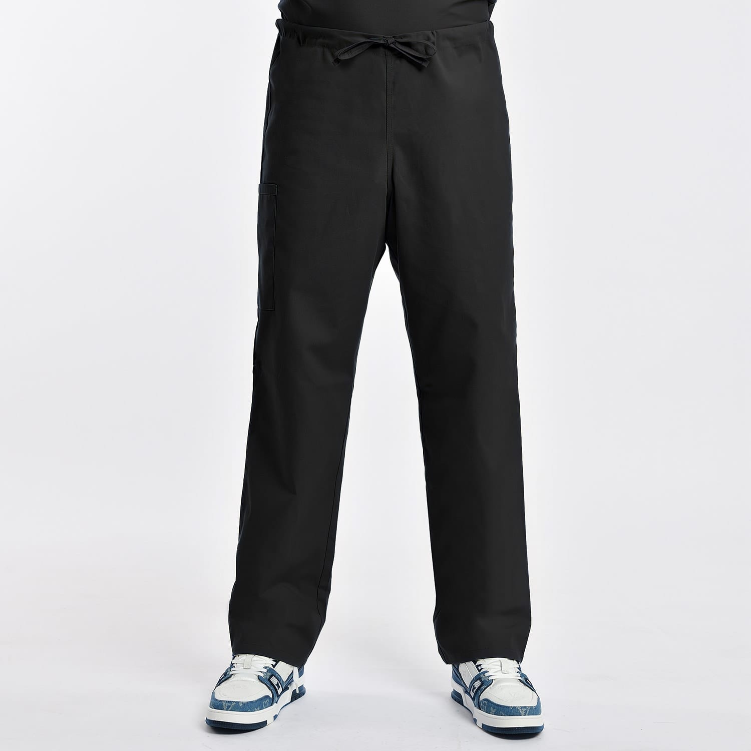 Unisex scrub pants with elastic waist and two pockets, available in blue. Breathable, durable, and suitable for industrial laundry.