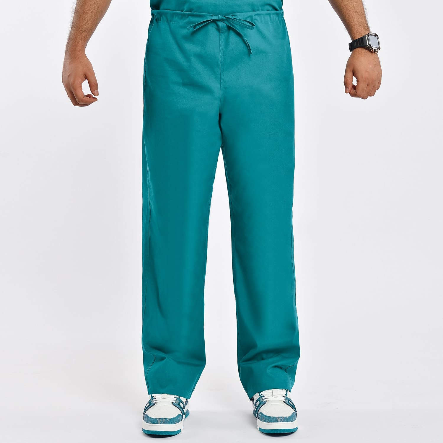 Teal unisex scrub pants with adjustable waist and functional pockets, designed for healthcare professionals.