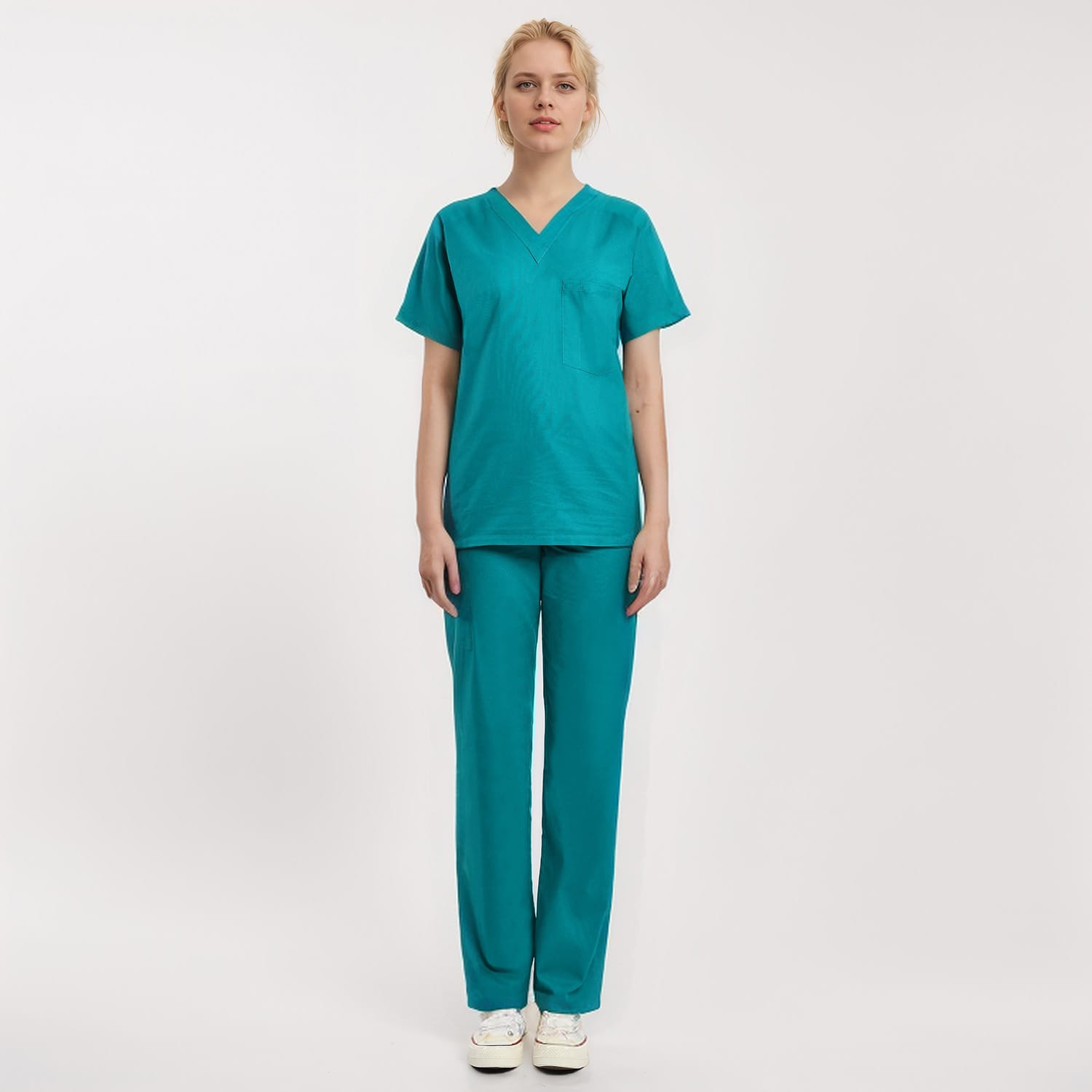 Front view of a model wearing a teal Scrub Unisex 1-Pocket V-Neck Scrub Top, ideal for healthcare workers.