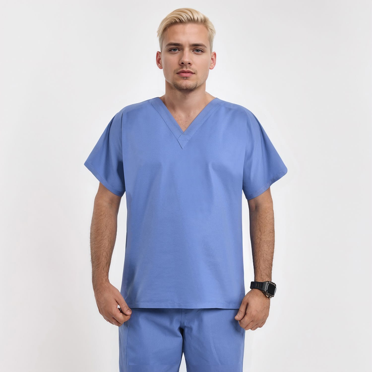 Front view of a male model wearing a blue unisex V-neck scrub top, designed for healthcare workers seeking comfort and style.