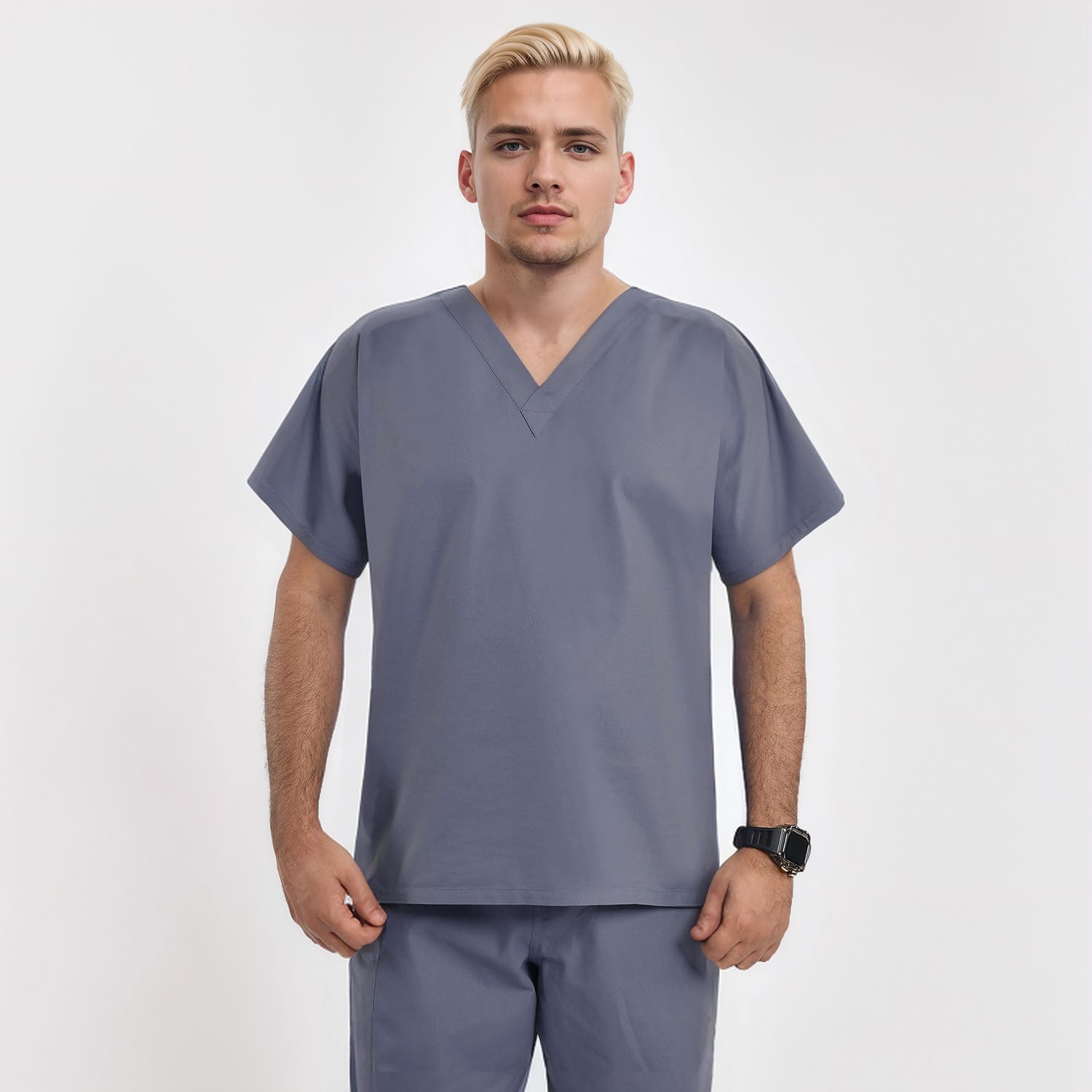 Front view of a male model wearing a gray unisex V-neck scrub top, perfect for medical professionals seeking both style and comfort.