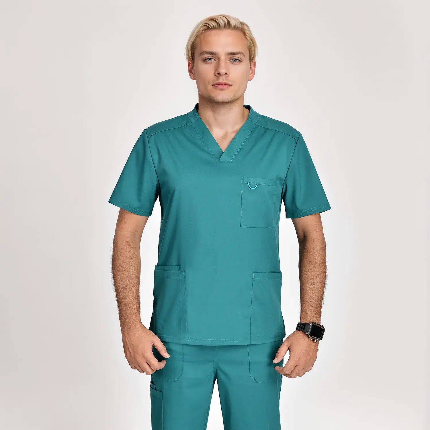 Men's medical scrub top in teal with short sleeves, v-neck design, and three pockets. Ideal for healthcare professionals seeking comfort and style.