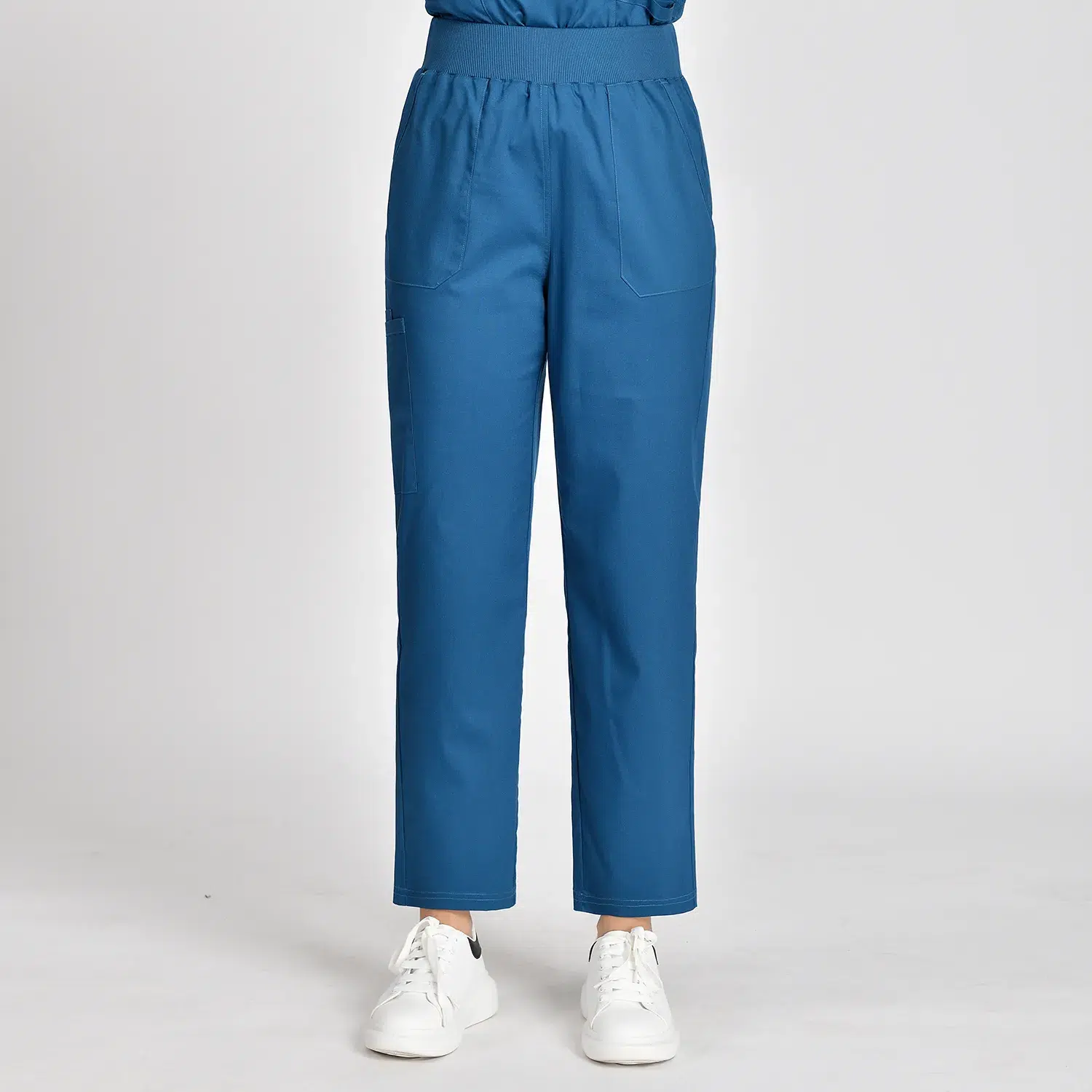 Blue women’s medical scrub pants with elastic waistband and four pockets, providing comfort and practicality for healthcare professionals.