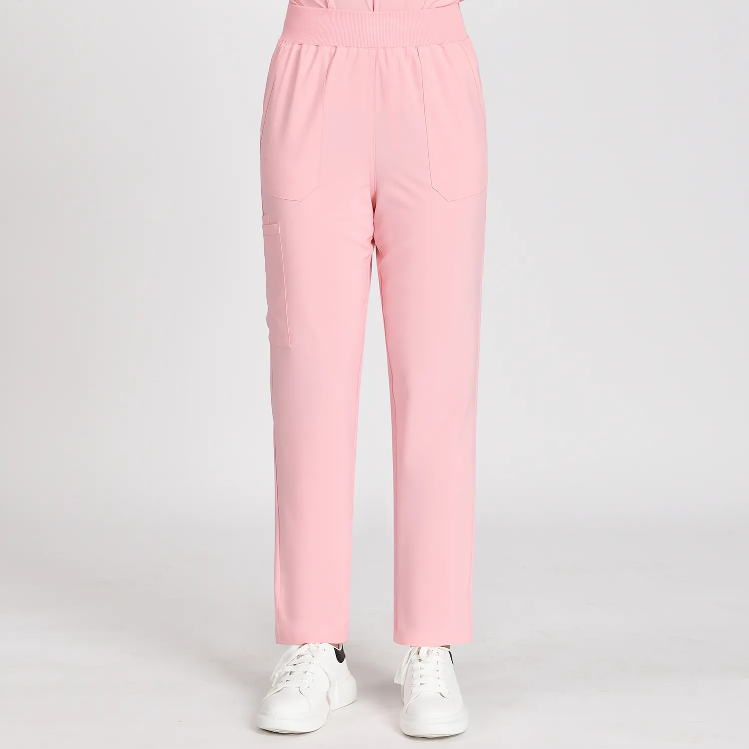 Front view of pink fashion women’s medical scrub pants with elastic waist and four pockets, designed for comfort and practicality for healthcare professionals.