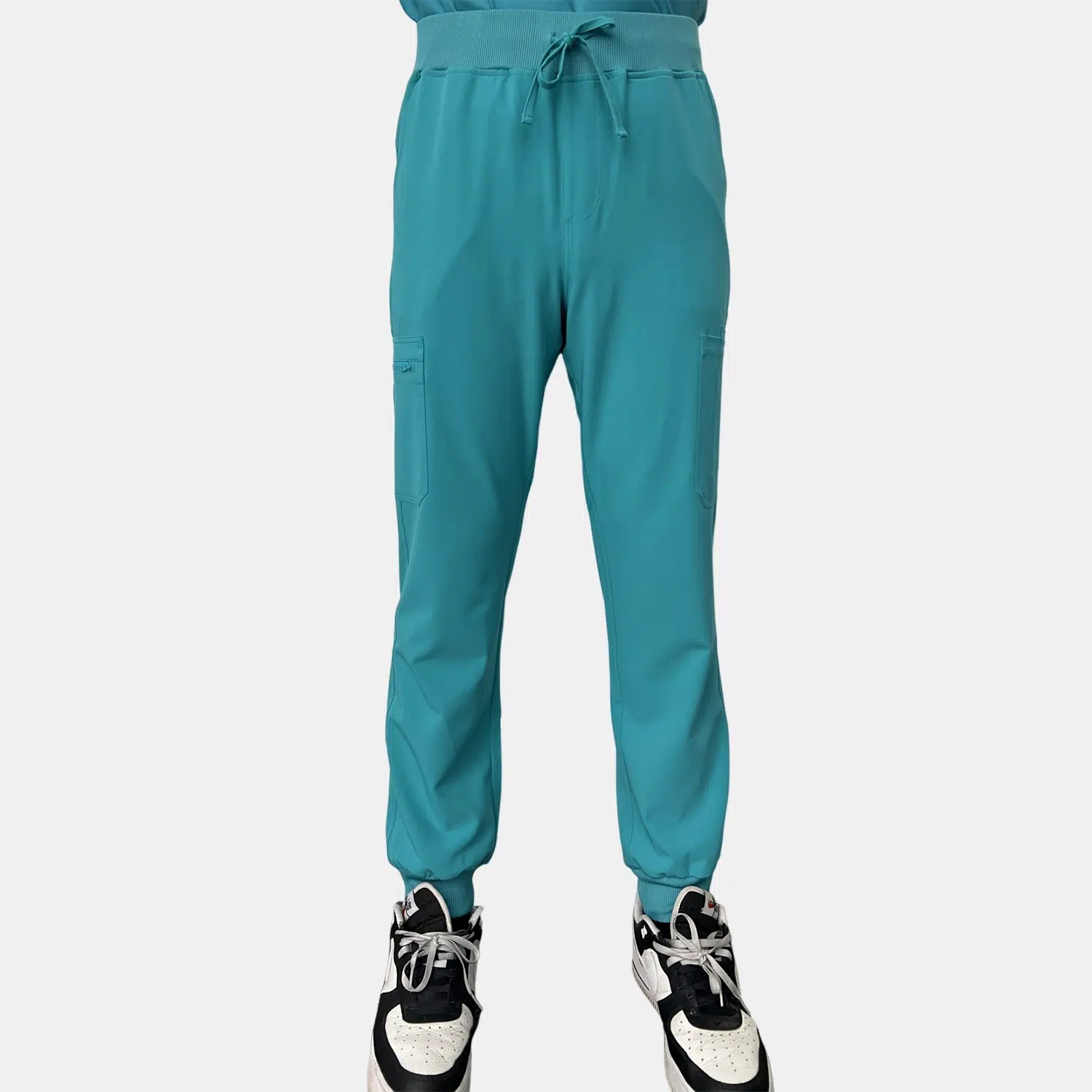 Custom teal medical scrub pants for healthcare workers with drawstring waist and functional pockets for convenience.