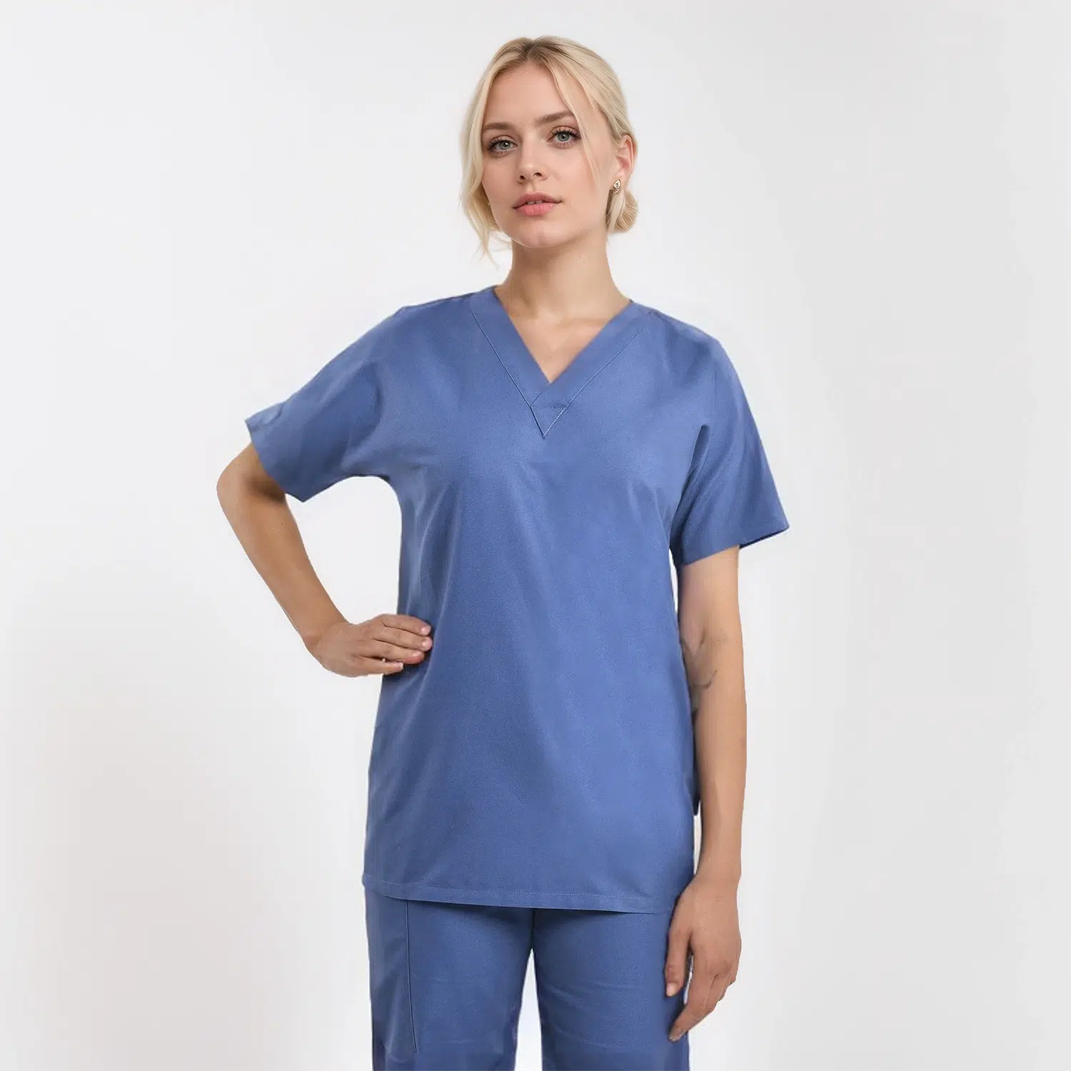 Unisex V-neck scrub top for women in blue, ideal for medical and healthcare settings.