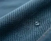 close-up of medical scrubs fabric texture showing breathable material