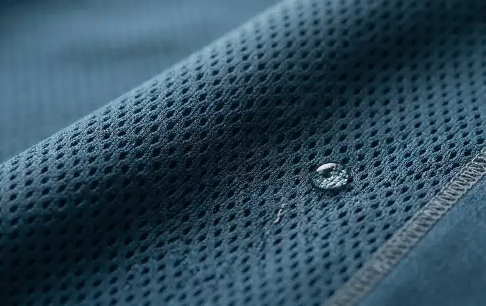 close-up of medical scrubs fabric texture showing breathable material